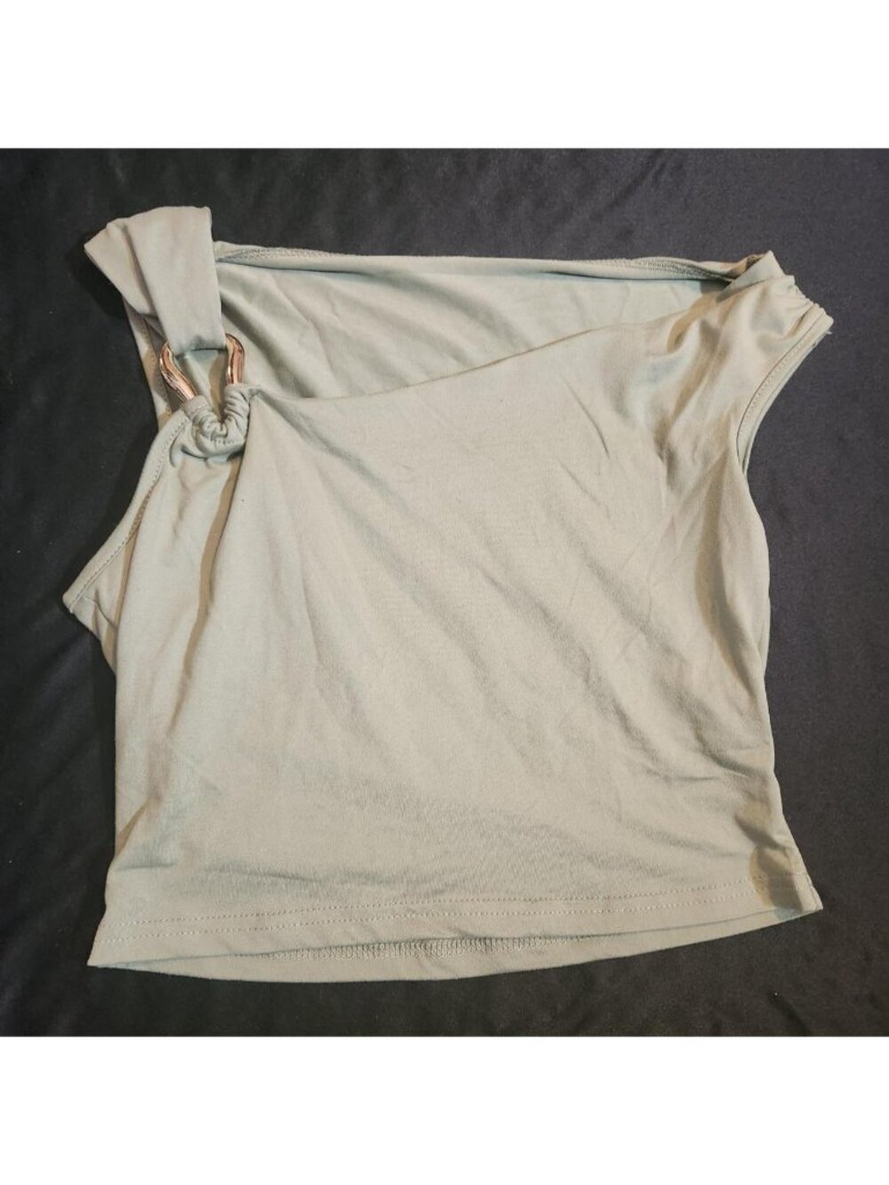 olive green top with gold ring
